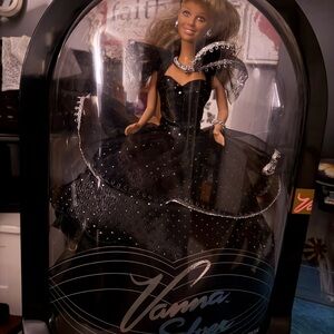 Elegant Black Doll with Silver Accents